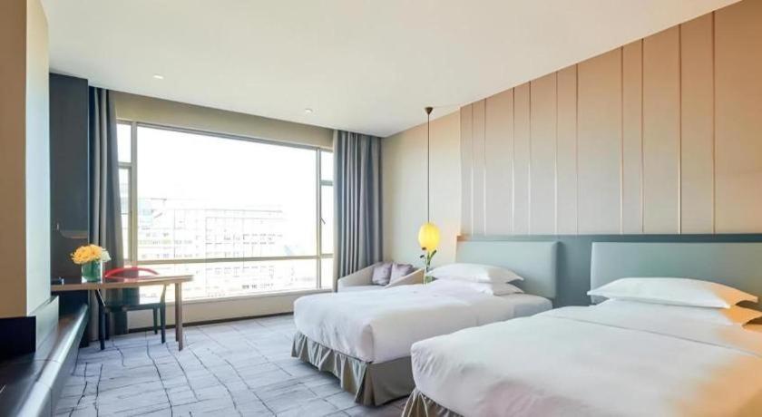 Maison New Century Hotel Dongguan Dongguan  Eksteriør billede